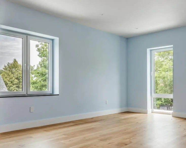 Bedroom painted in a soft blue